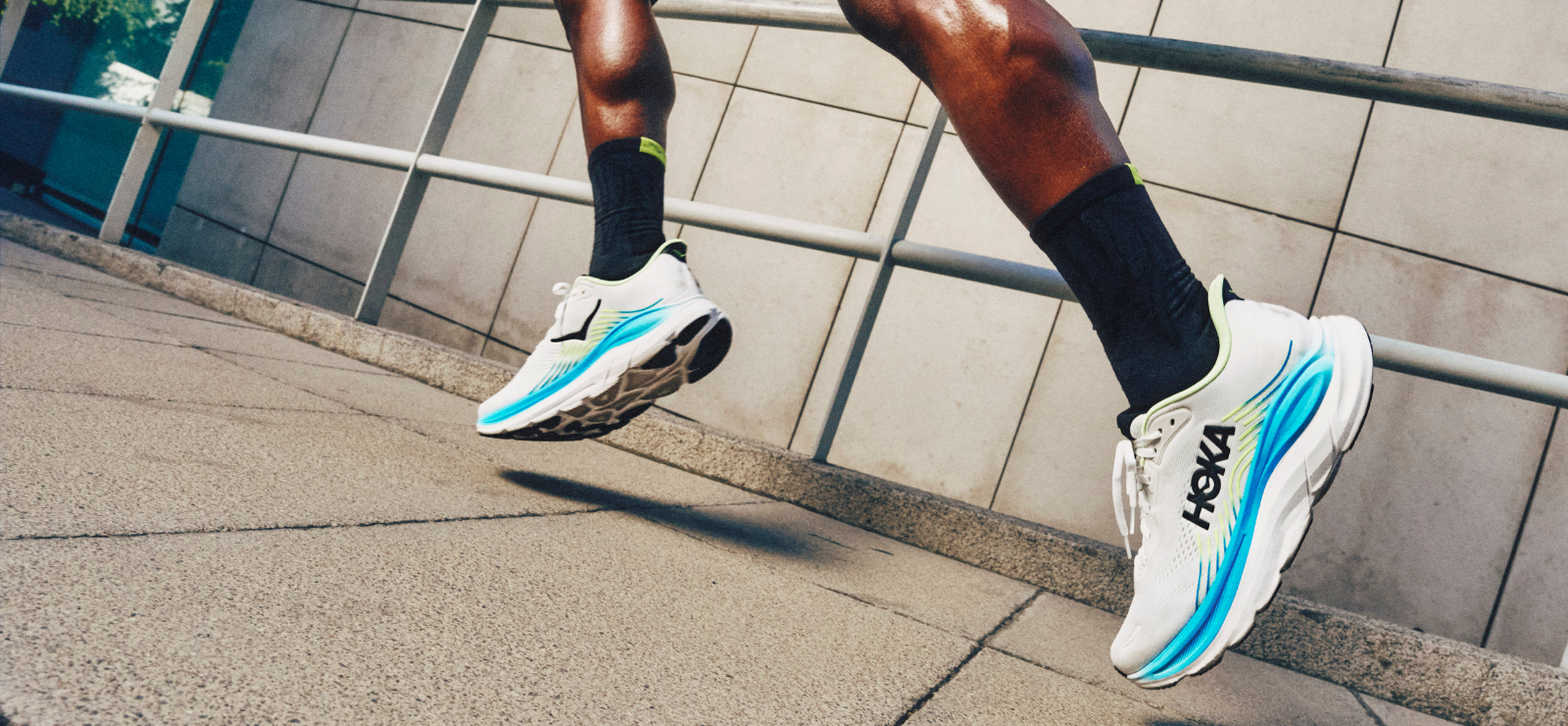 man running in Hokas